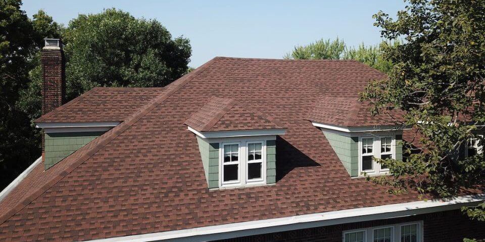 New architectural asphalt shingles transformed the look of this Eau Claire home while providing outstanding protection from wind, rain, snow, and ice. Architectural shingles offer greater durability and enhanced curb appeal compared to traditional 3-tab roofing materials. photo