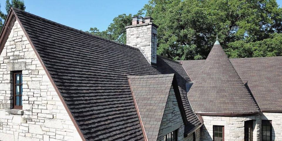 Premium architectural shingles were selected for this custom Eau Claire home to provide lasting durability while complementing its exterior design. Choosing experienced roofing professionals helps ensure your investment is protected for decades. photo