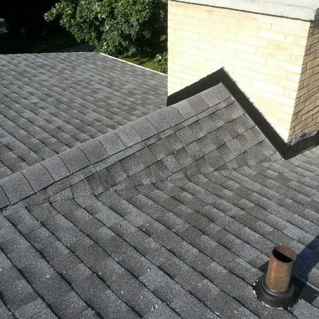 Proper chimney flashing is essential to protecting your home from water intrusion. Every roof replacement should include careful flashing installation to help prevent leaks around one of the roof's most vulnerable areas. photo