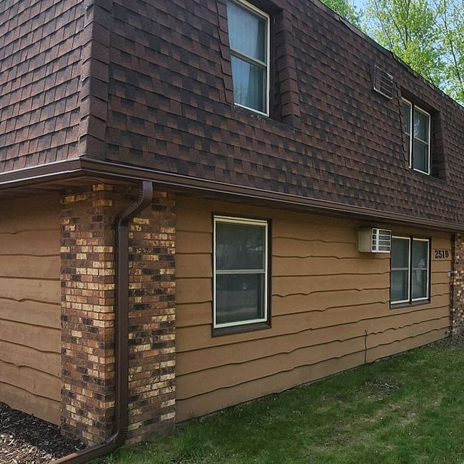 Mansard roof replacements require specialized experience due to their unique design and steep roof sections. Professional installation helps preserve the home's architectural character while providing dependable weather protection. photo