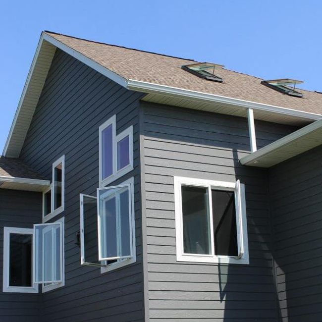 This residential roof replacement completed in Eau Claire features premium architectural asphalt shingles that provide lasting durability, dependable weather protection, and enhanced curb appeal. A professionally installed roofing system helps safeguard your home while increasing its long-term value. photo