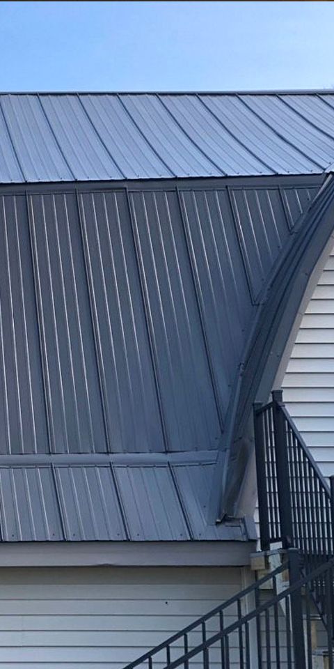 Standing seam metal roofing was installed to provide exceptional durability, superior weather resistance, and decades of low-maintenance performance. Metal roofing is one of the longest-lasting residential roofing options available, making it an excellent investment for homeowners seeking long-term value and energy efficiency. photo