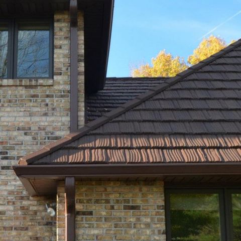 This stone-coated steel roofing in Eau Claire delivers the beauty of traditional roofing materials with the unmatched strength of steel. This premium roofing system is designed to withstand harsh weather while providing decades of low-maintenance performance. photo