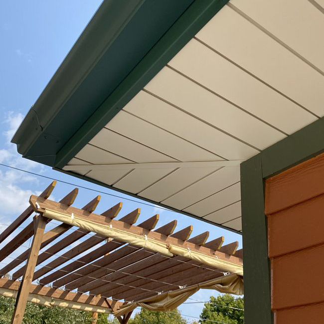 Proper soffit installation with contrasting colors photo